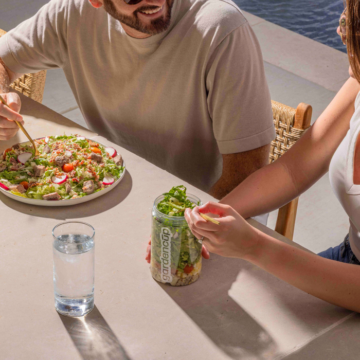 Two people enjoying Gardencup outdoors